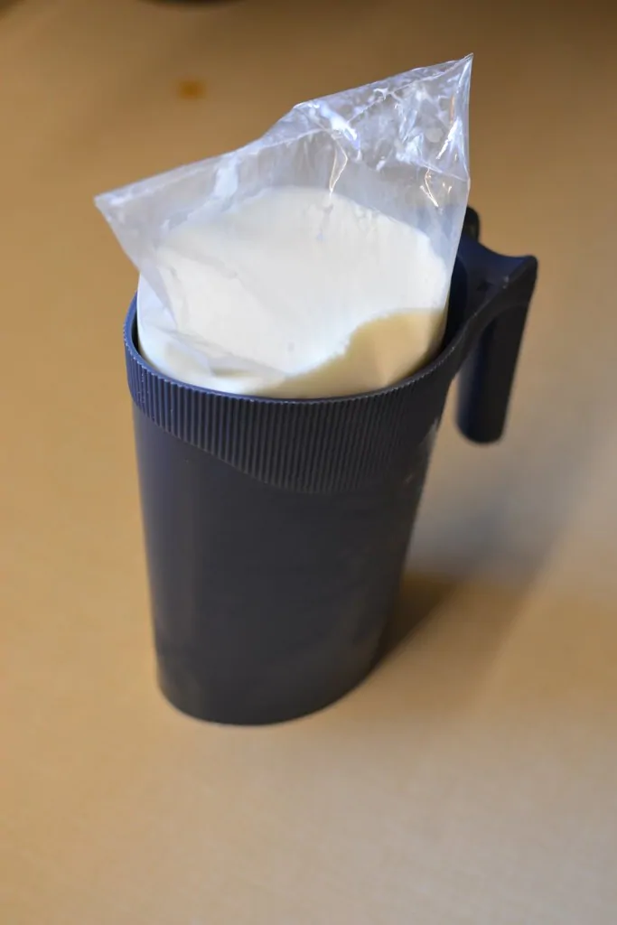 milk-bag-in-a-plastic-container